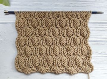 Point en Relief avec Ovales au Tricot